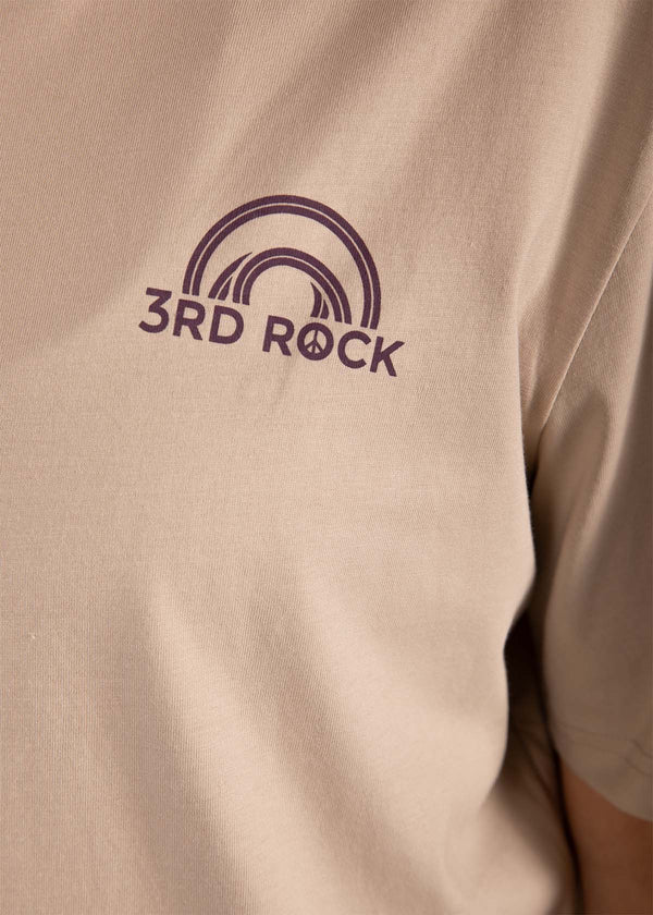 a close up of our chest logo on the horizon logo tee, featuring a small peace symbol in the "O"