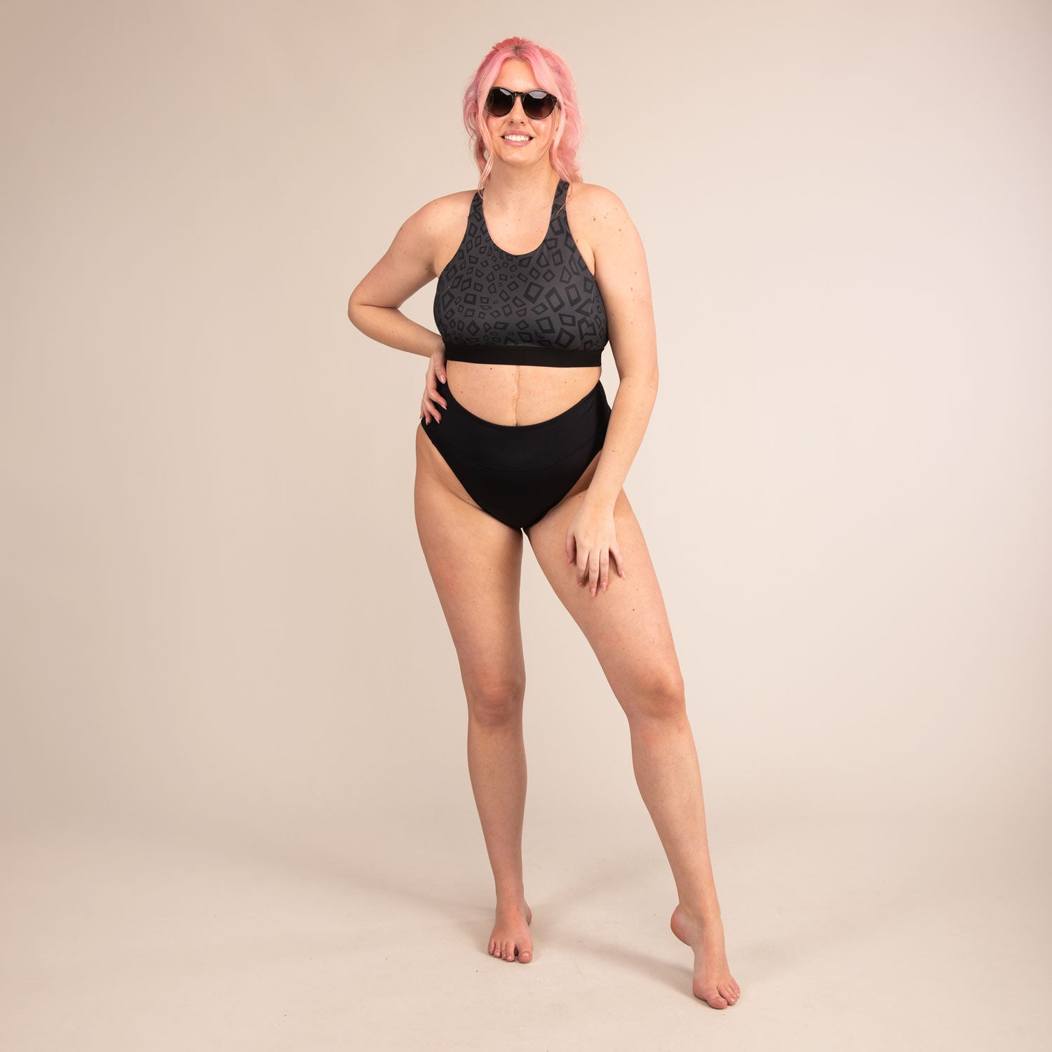 EQUINOX MINIMAL LEOPARD | Reversible Recycled Sports Bra | 3RD ROCK Clothing -  Sophie is a 34G with a 32" underbust, 40.5" overbust and wears a size 16 F