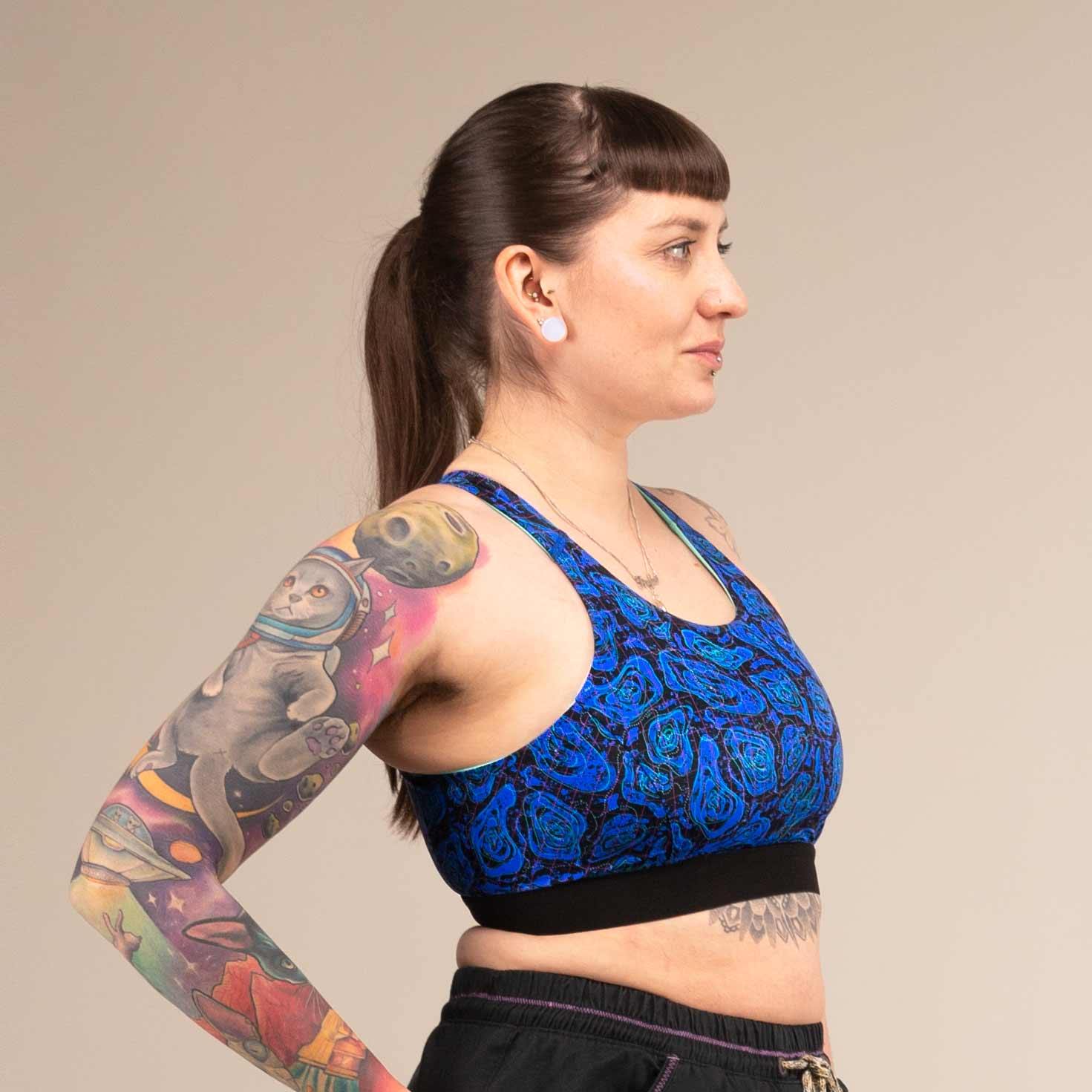 EQUINOX GEO JAGUAR | Reversible Recycled Sports Bra | 3RD ROCK Clothing -  Laura is a 32E with a 30"underbust, 36" overbust and wears a size 14 F