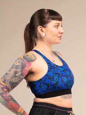 EQUINOX GEO JAGUAR | Reversible Recycled Sports Bra | 3RD ROCK Clothing -  Laura is a 32E with a 30
