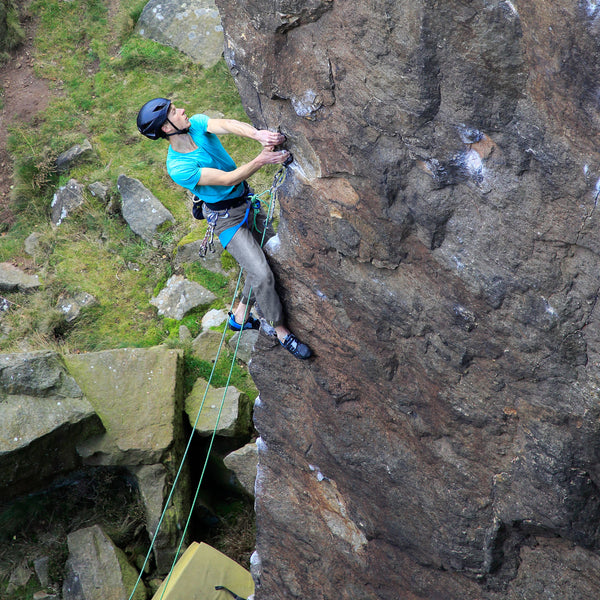 Jerome pulling hard whilst leading this classic climbing in the peak district. M