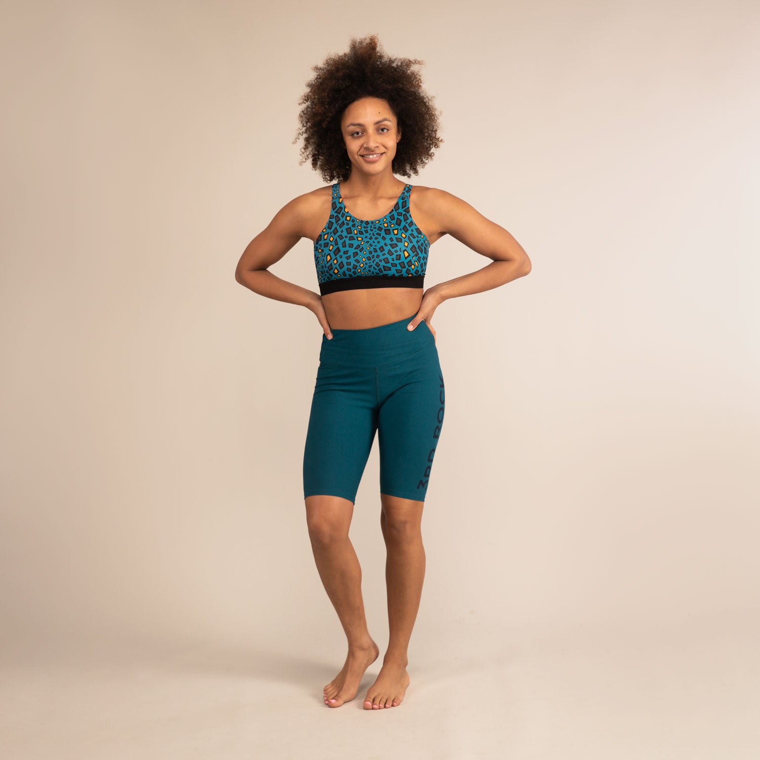 EQUINOX MINIMAL REPTILE | Reversible Recycled Sports Bra | 3RD ROCK Clothing -  Kendal is a 34D with a 32" underbust, 36" overbust and wears a size 12 F